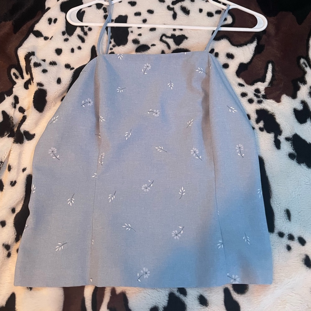 Light blue floral tank top.